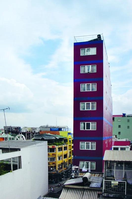 There is constant momentum in the townscape due to the unregulated building process of the ‘new-style’ shophouses. Each house is different because they vary so much in height, material and color.
