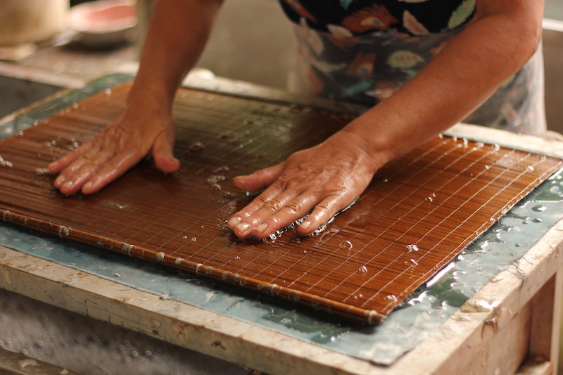 pressing the bamboo screen